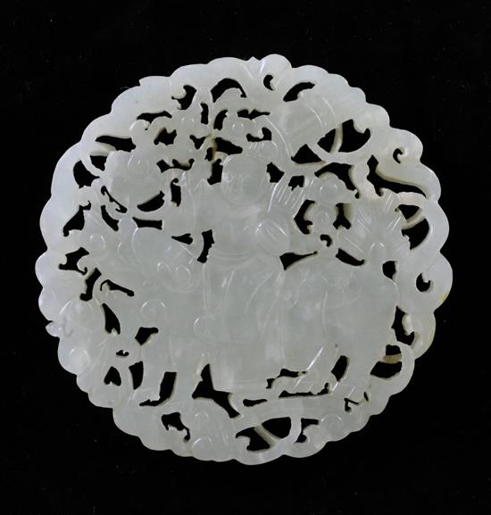 A Chinese pale celadon jade disc, late 19th / early 20th century, 6.9cm